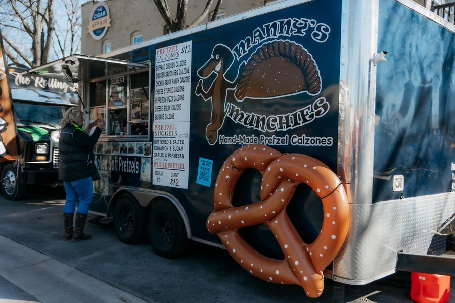 Food trucks lined up on Conant Street at Acoustics for Autism